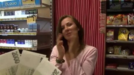 Young mature Lara Braun in a shop in HD